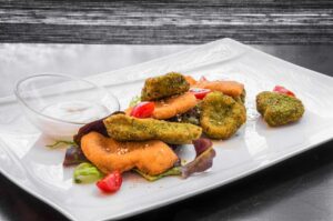 Mini chicken and pork schnitzels