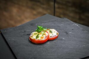 Baked tomato with mozzarella